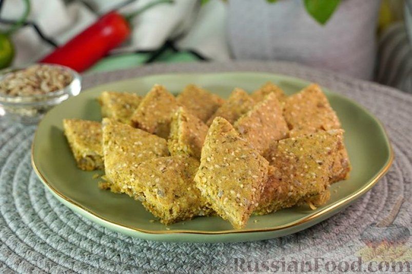 Овсяные крекеры с сыром и семечками: здоровый перекус с хрустящей корочкой Овсяные крекеры с сыром и семечками: здоровый перекус с хрустящей корочкой